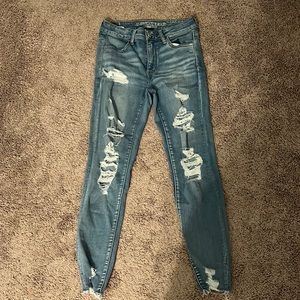 american eagle ripped blue jeans